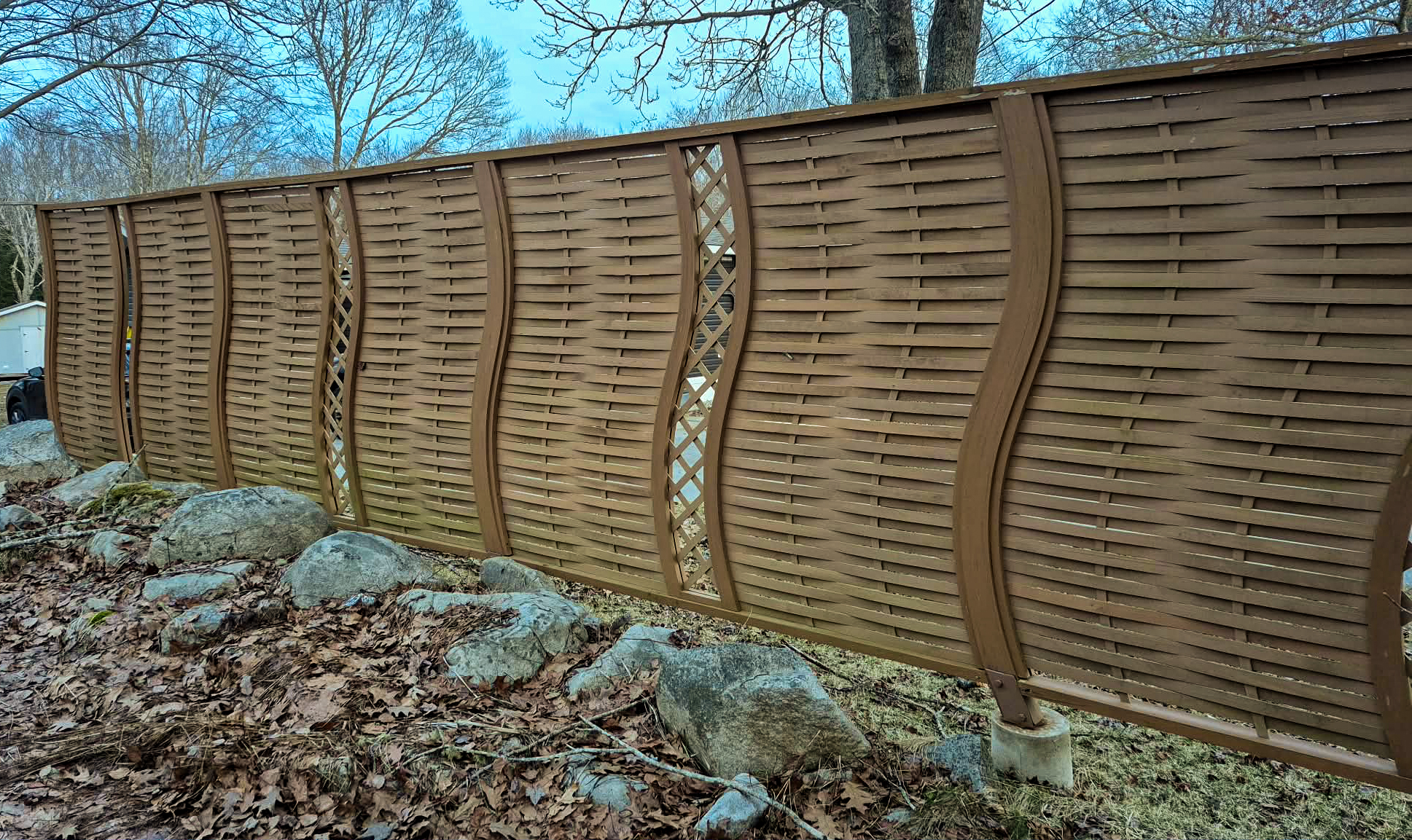 Curved wooden privacy fence